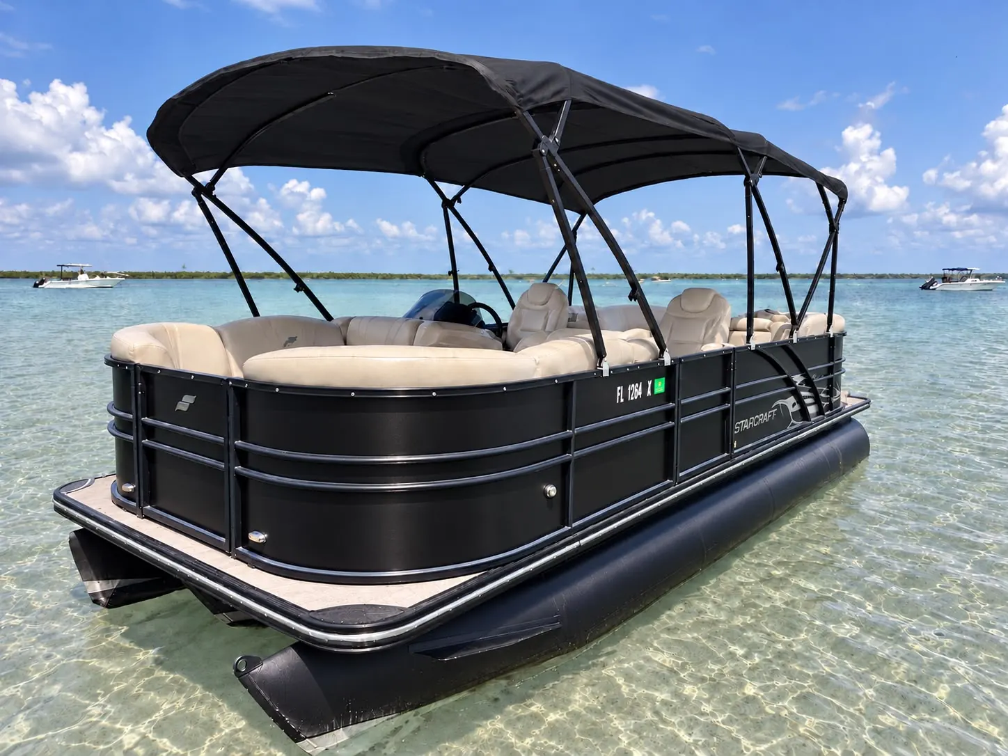 Sandbar Miami's new 25-foot black Starcraft pontoon anchored in clear water at the sandbar